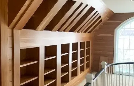 Photo of a custom built-in cherry wood library